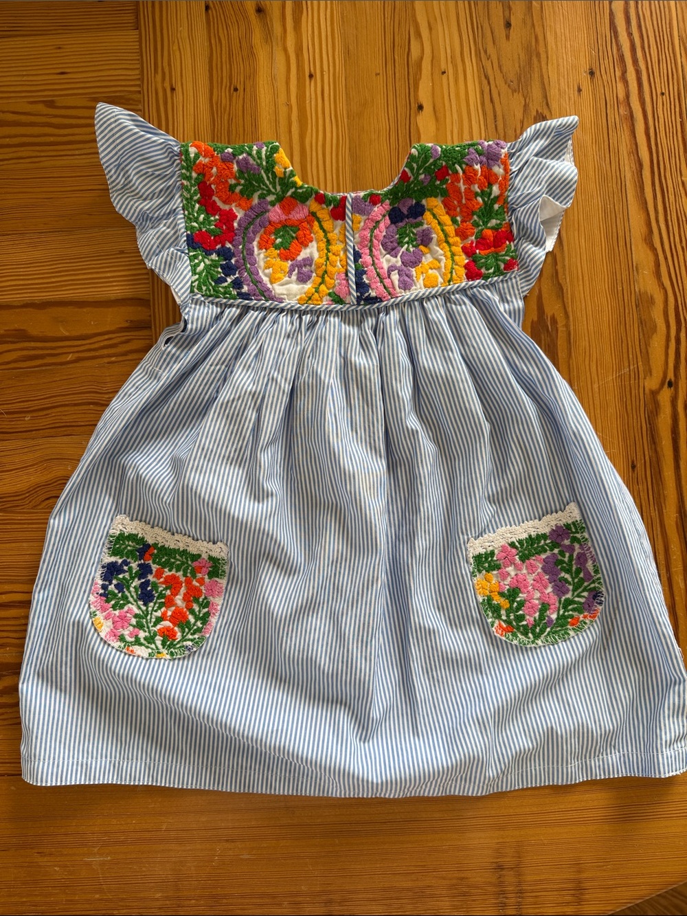 Mi Golondrina Embroidered Blue Striped Girls' Dress with Floral Accent